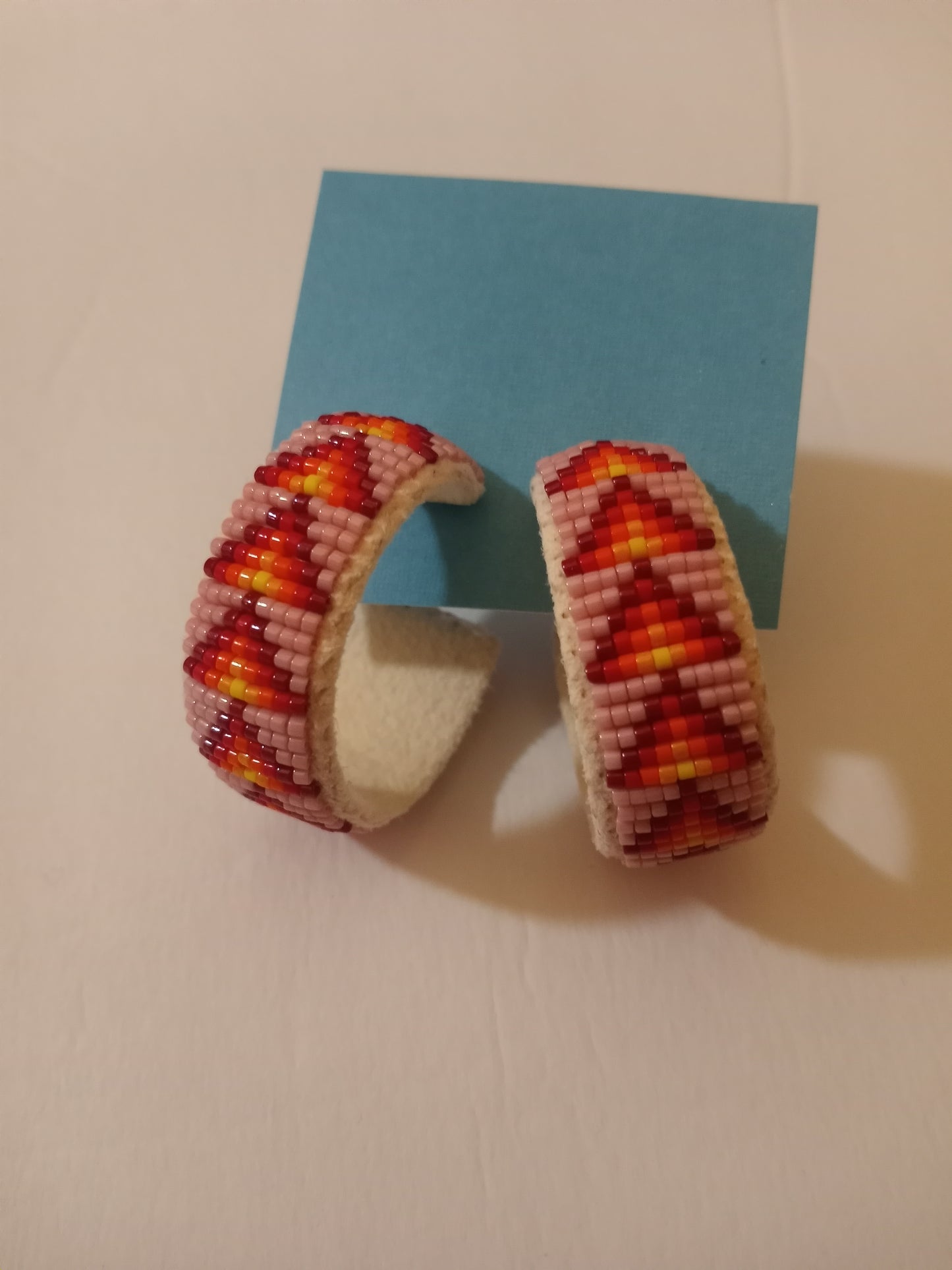 Pink beaded hoop earrings