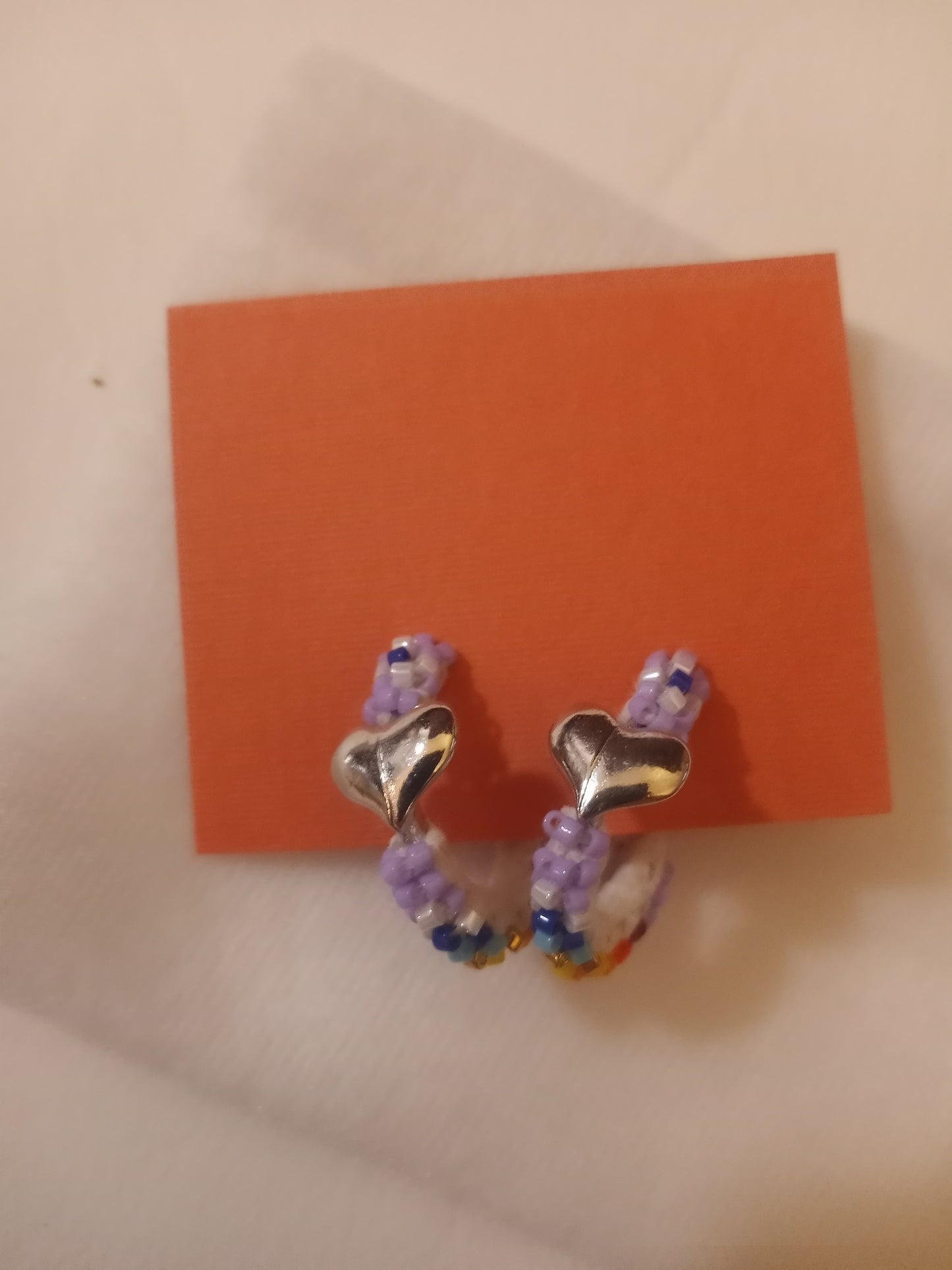 Sm purple hoop earrings